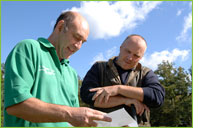 Clive Winslow talking to a driver